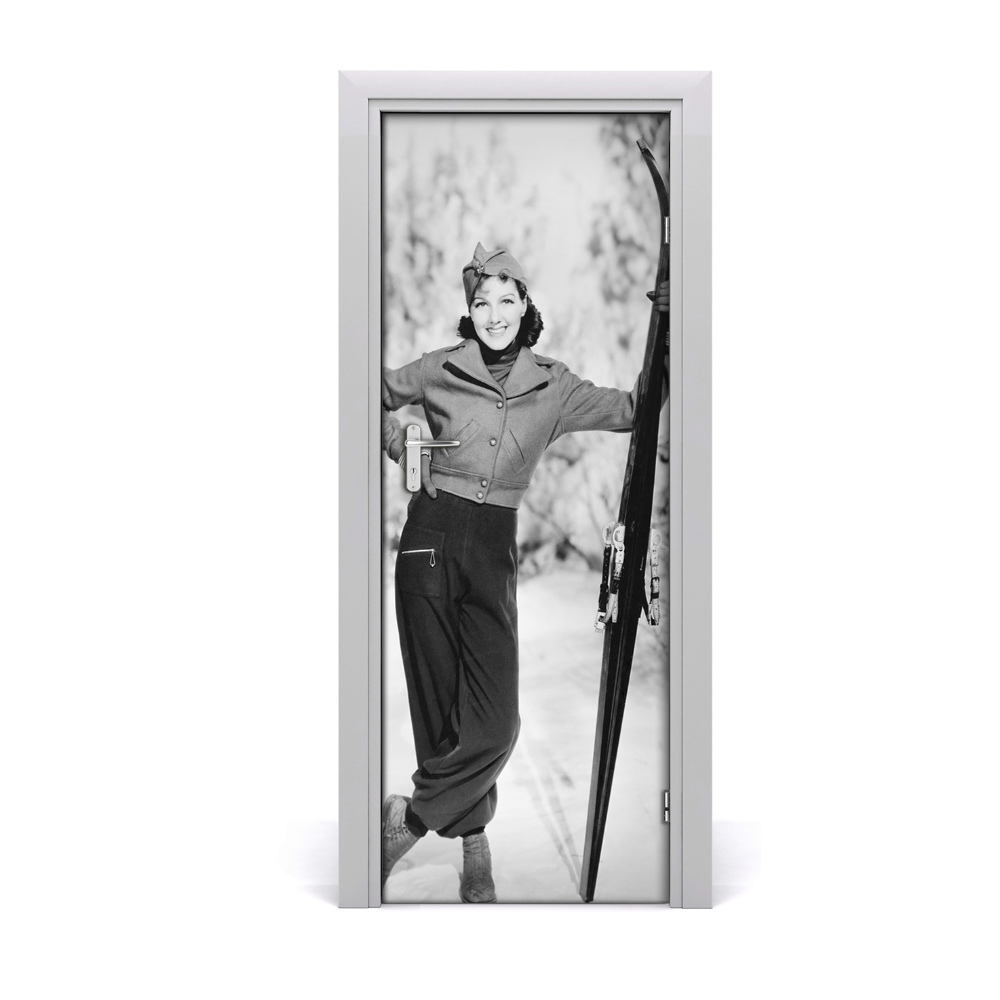 Fototapeta samolepiace na dvere Čiernobiela žena a lyže