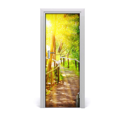 Fototapeta na dvere Cesta v lese medzi stromami