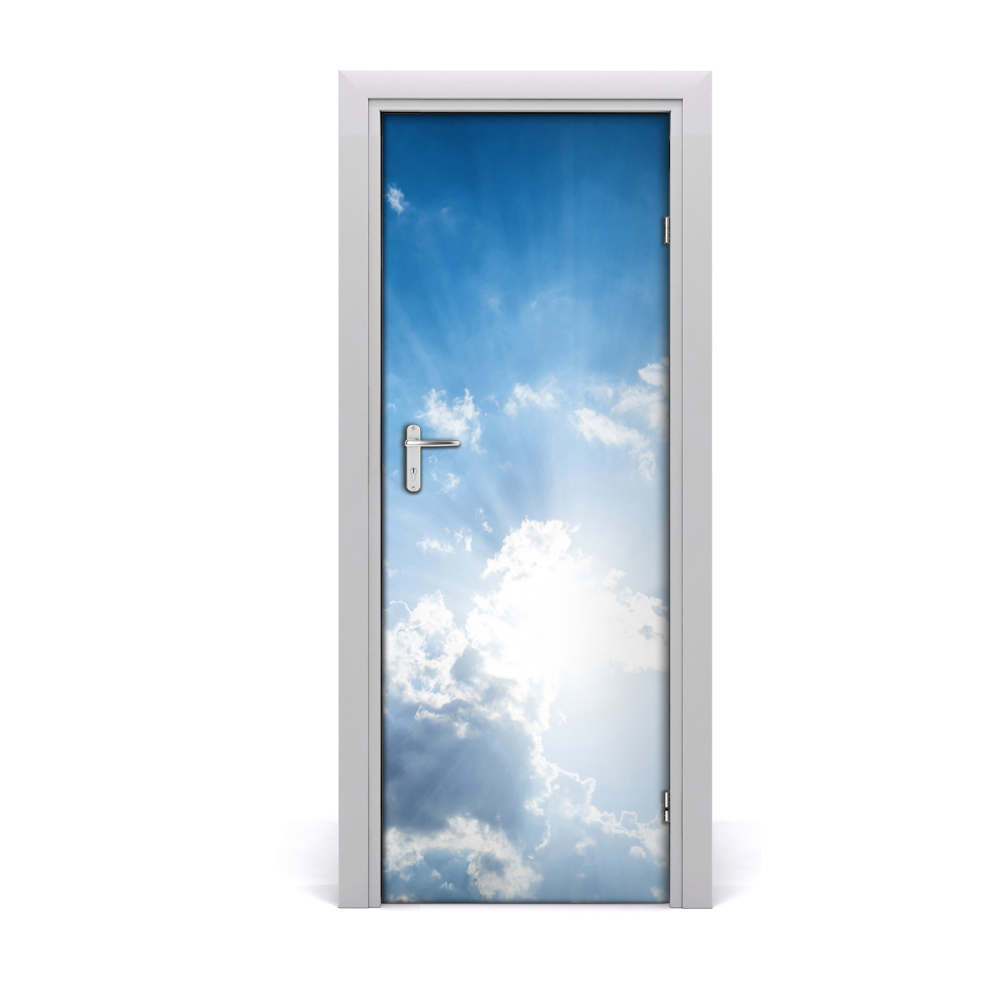 Fototapeta na dvere Slnečné lúče za mrakmi