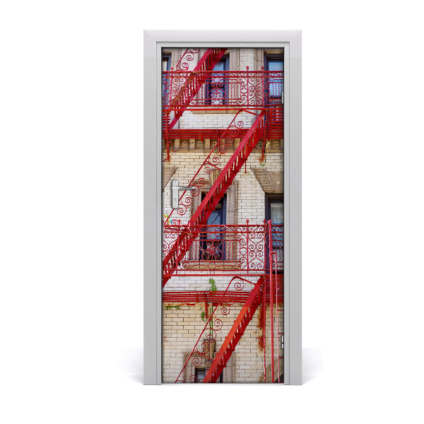Fototapeta samolepiace na dvere Nájomný dom červené schodisko