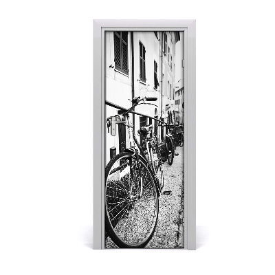 Fototapeta na dvere Mestské bicykle čiernobiele
