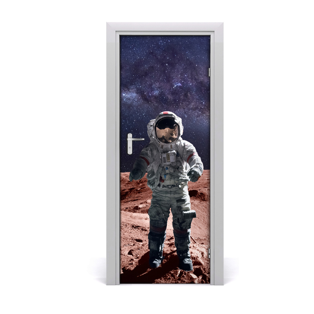 Fototapeta na dvere Astronaut na oblohe