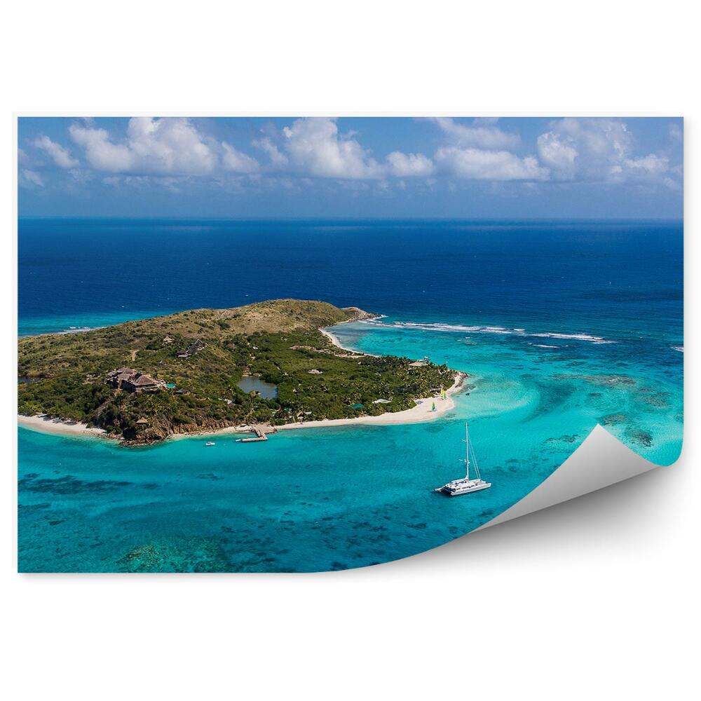 Fototapeta Zelený ostrov na mori loď útes