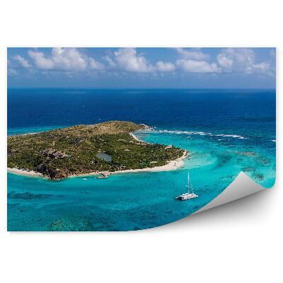 Fototapeta Zelený ostrov na mori loď útes