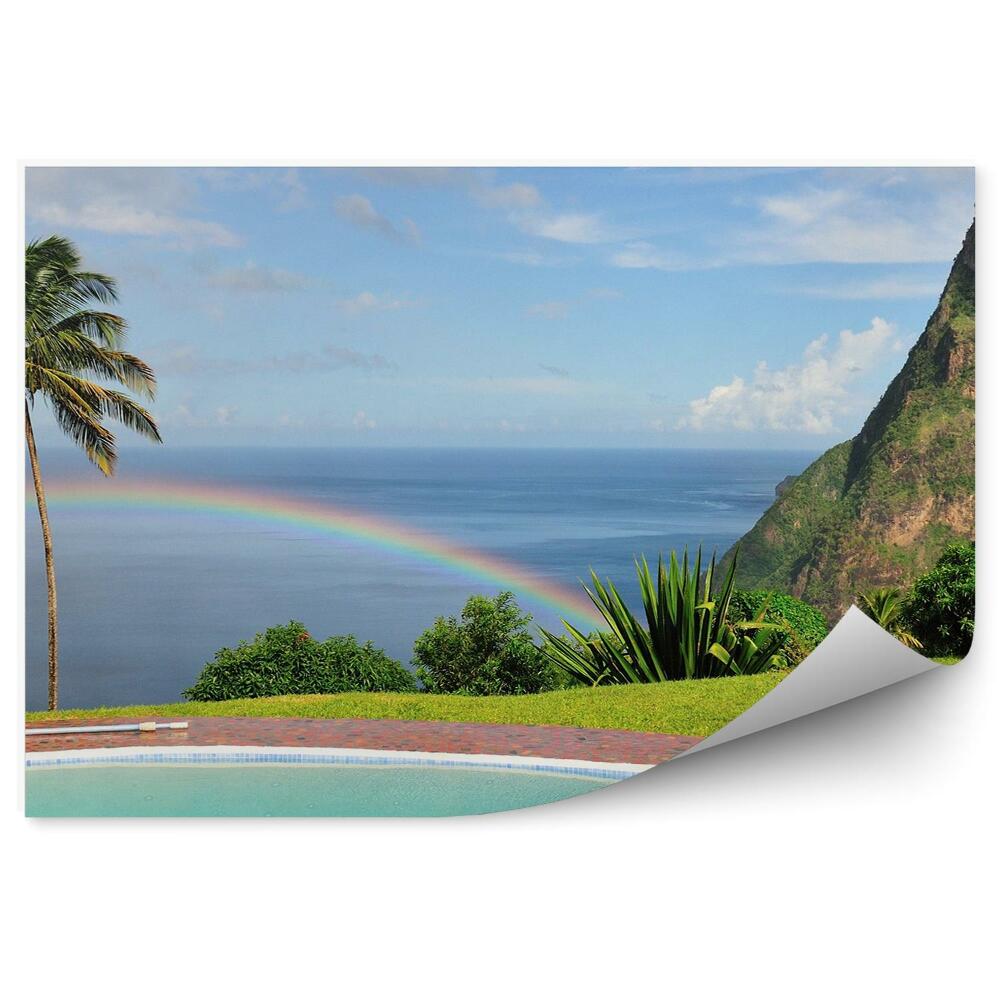 Fototapeta na stenu Bazén Skaly Oceán Palmy Obloha Mraky Dúha