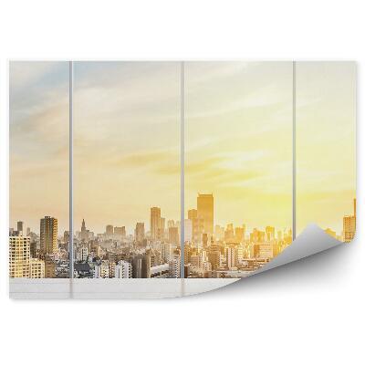 Fototapeta na stenu Slnečné svetlo dopadajúce na mestské budovy