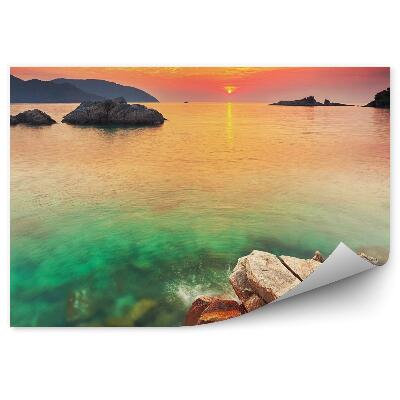 Fototapeta Východ slnka nad vodou