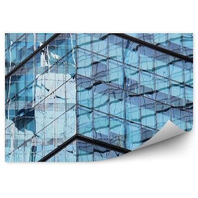 Fototapeta Odsev svetlobe, ki se odbija od steklenih oken stavbe