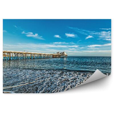 Fototapeta Mólo more pláž mraky