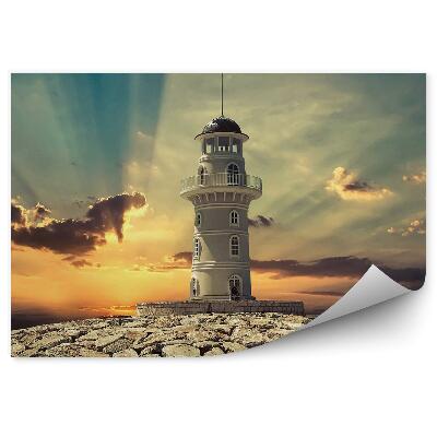 Fototapeta Pobrežný maják biele skaly slnečný svit