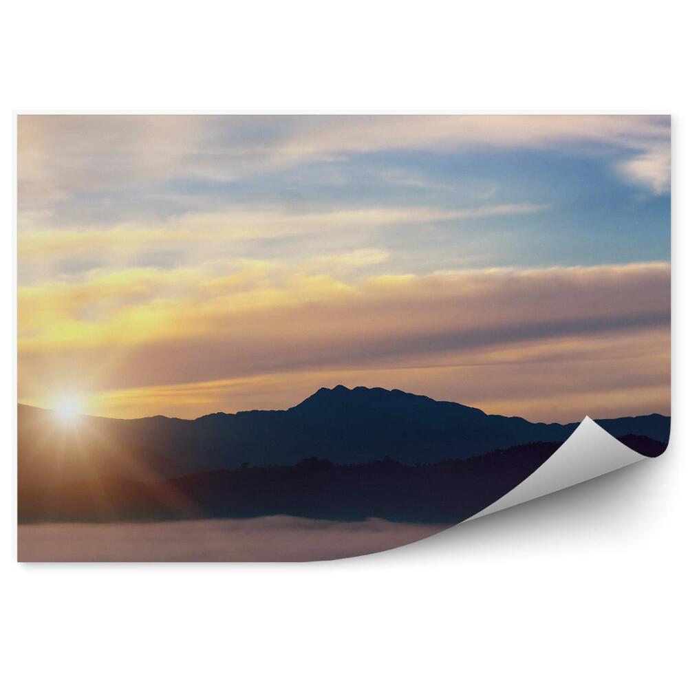 Fototapeta na stenu Hory západ slnka hmla vrcholky stromov tráva