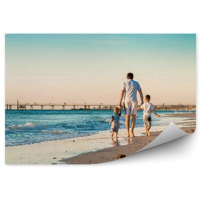 Fototapeta na stenu Otec Deti Most Budovy Pláž Oceán Obloha Mraky