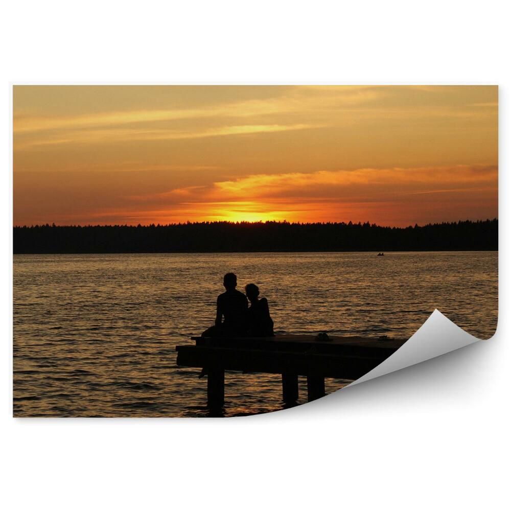 Fototapeta na stenu Sončni zahod voda gozdni pomol