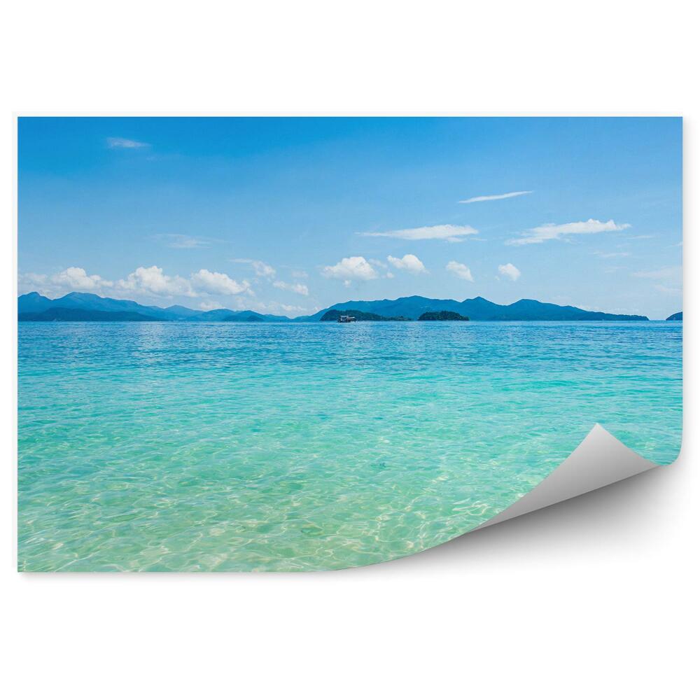 Fototapeta na stenu Piesok Oceán Hory Obloha Mraky