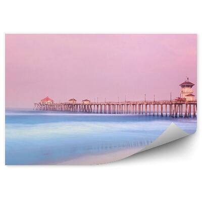 Fototapeta na stenu Betonski pomol ob plaži morje