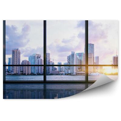 Fototapeta na stenu Slnečné svetlo medzi budovami mesto rieka