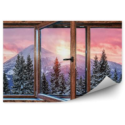 Fototapeta Zimný sneh drevené okno v chalupe s výhľadom na vianočné stromčeky