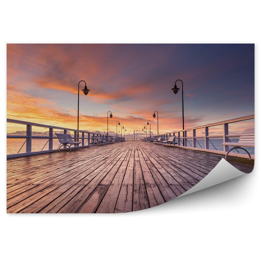 Fototapeta na stenu Zamračená obloha západ slnka mólo