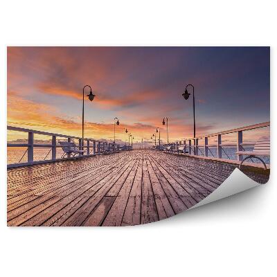 Fototapeta na stenu Zamračená obloha západ slnka mólo