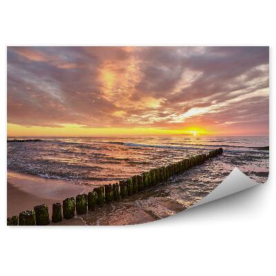 Fototapeta Rozbúrená morská pena piesočné mraky na oblohe