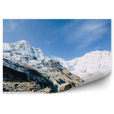 Fototapeta Sneh na úpätí himalájskych hôr modrá obloha