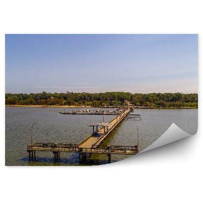 Fototapeta Turistické mólo voda zelená vegetácia