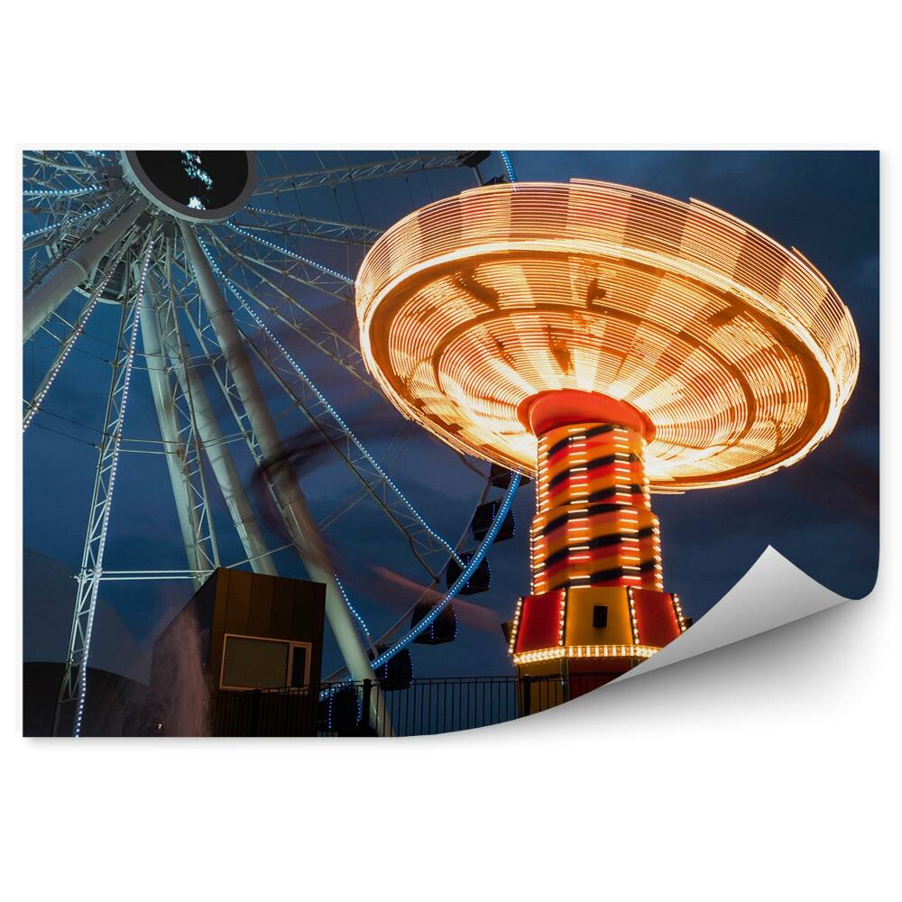 Fototapeta Osvetlené kolotoče na oblohe