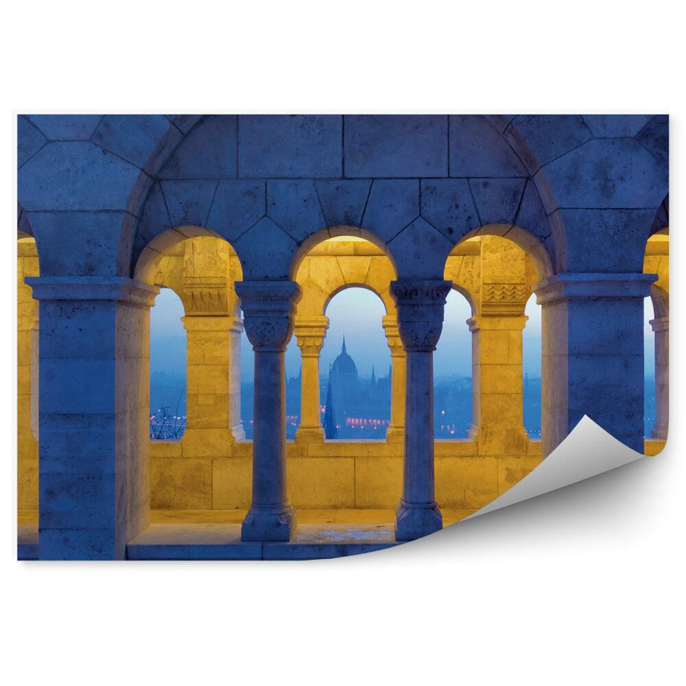 Fototapeta na stenu Osvetljeni stolpiči arkadne stolpnice