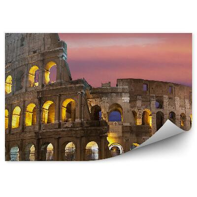 Fototapeta Osvetlené koloseum na pozadí farebnej oblohy