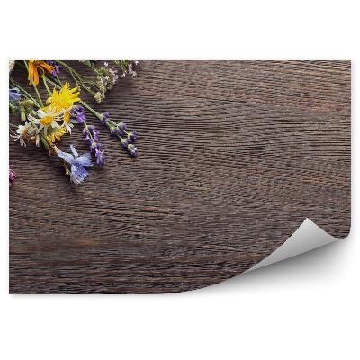 Fototapeta Nožnicová guľa a kvety na drevenej doske