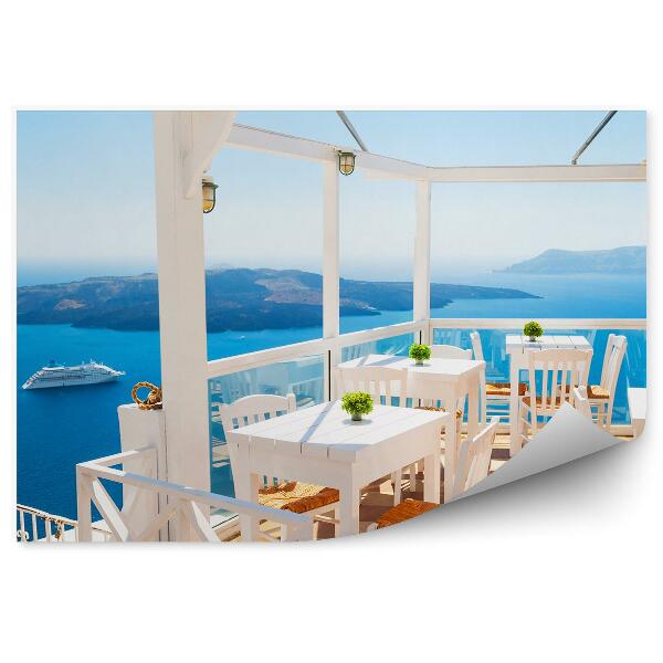 Fototapeta Terasa stoličky stoly more jachty hory Santorini Grécko