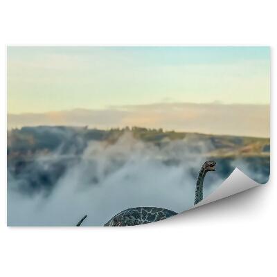 Fototapeta na stenu Figúrka brontosaura na pozadí kopcov