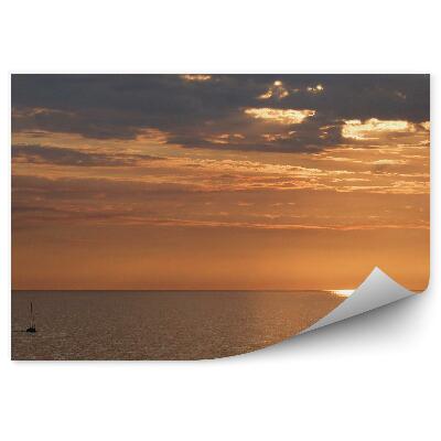 Fototapeta Slnečný svit spoza mrakov pokojné vody Stredozemného mora