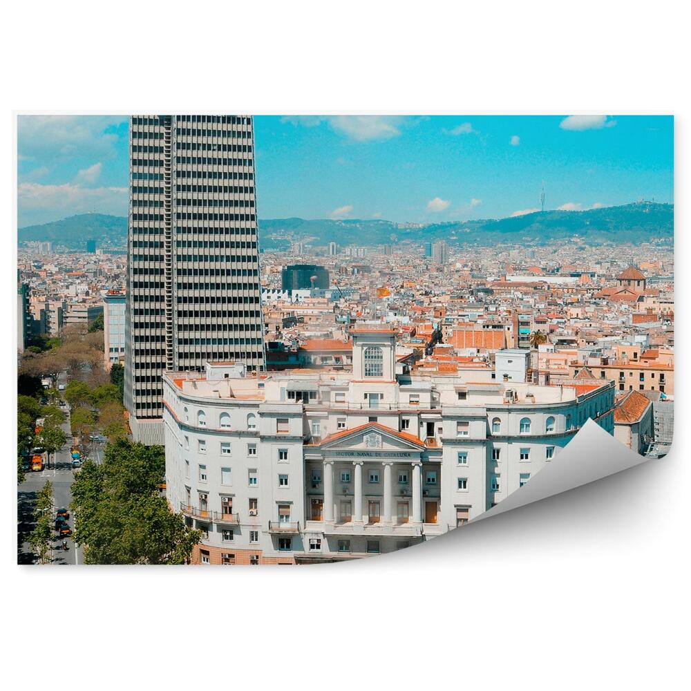 Fototapeta na stenu Budovy stromy cesta ľudia obloha mraky Barcelona Španielsko