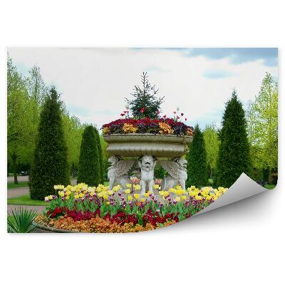 Fototapeta Stromy kvety tráva aleja obloha mraky levy palmy