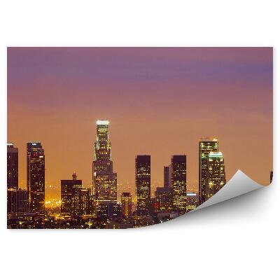 Fototapeta na stenu Mrakodrapy Los Angeles svetlá pri západe slnka