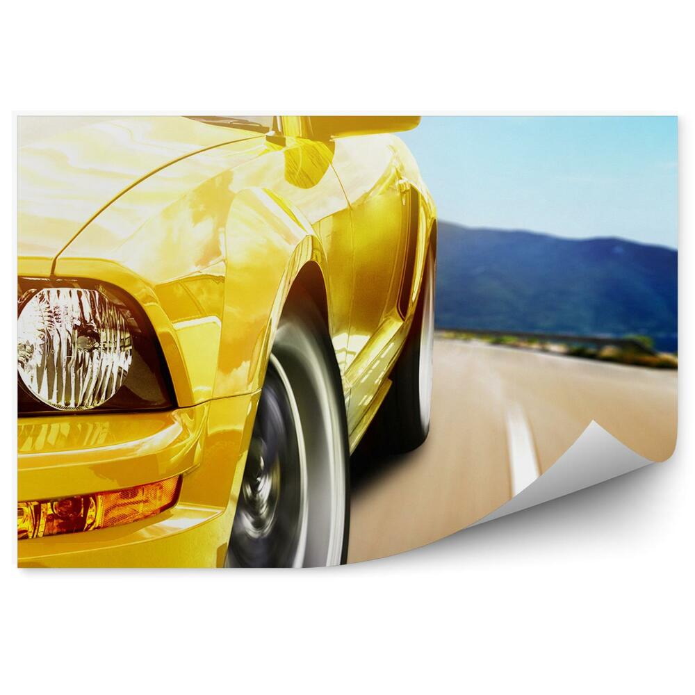 Fototapeta Žlté športové auto na pozadí cesty v horách