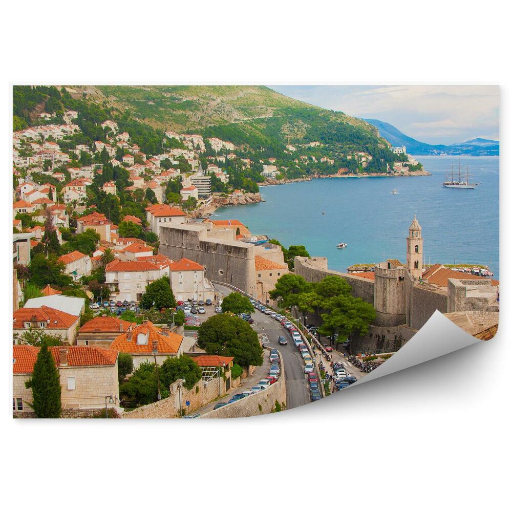 Fototapeta Budovy cesta doprava more hory obloha mraky zelená