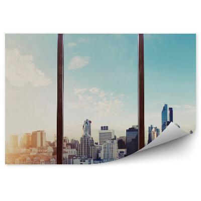 Fototapeta na stenu Okno s výhľadom na mesto mrakodrapy mestské budovy