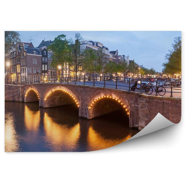 Fototapeta Panoráma krásne kanály amsterdam budovy stromy bicykle motorky stromy svetlá rieka