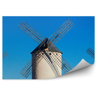 Fototapeta Trije veliki beli mlini na veter na modrem nebu