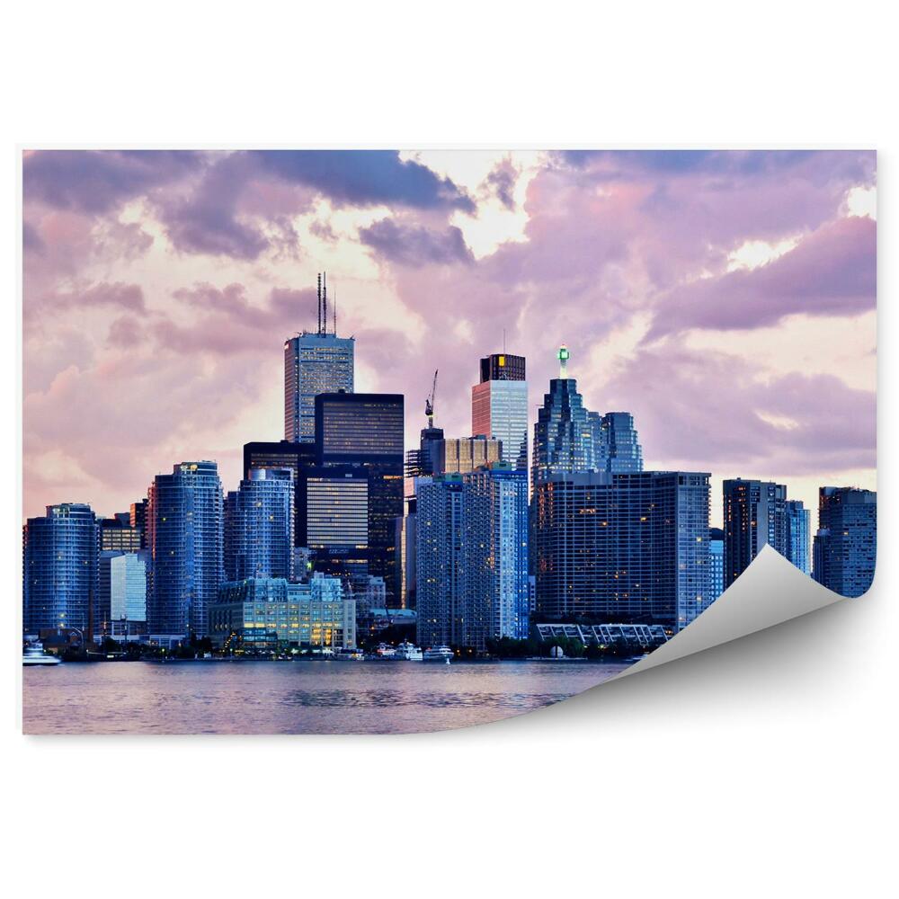 Fototapeta Pohľad na mestské budovy ružové svetlo