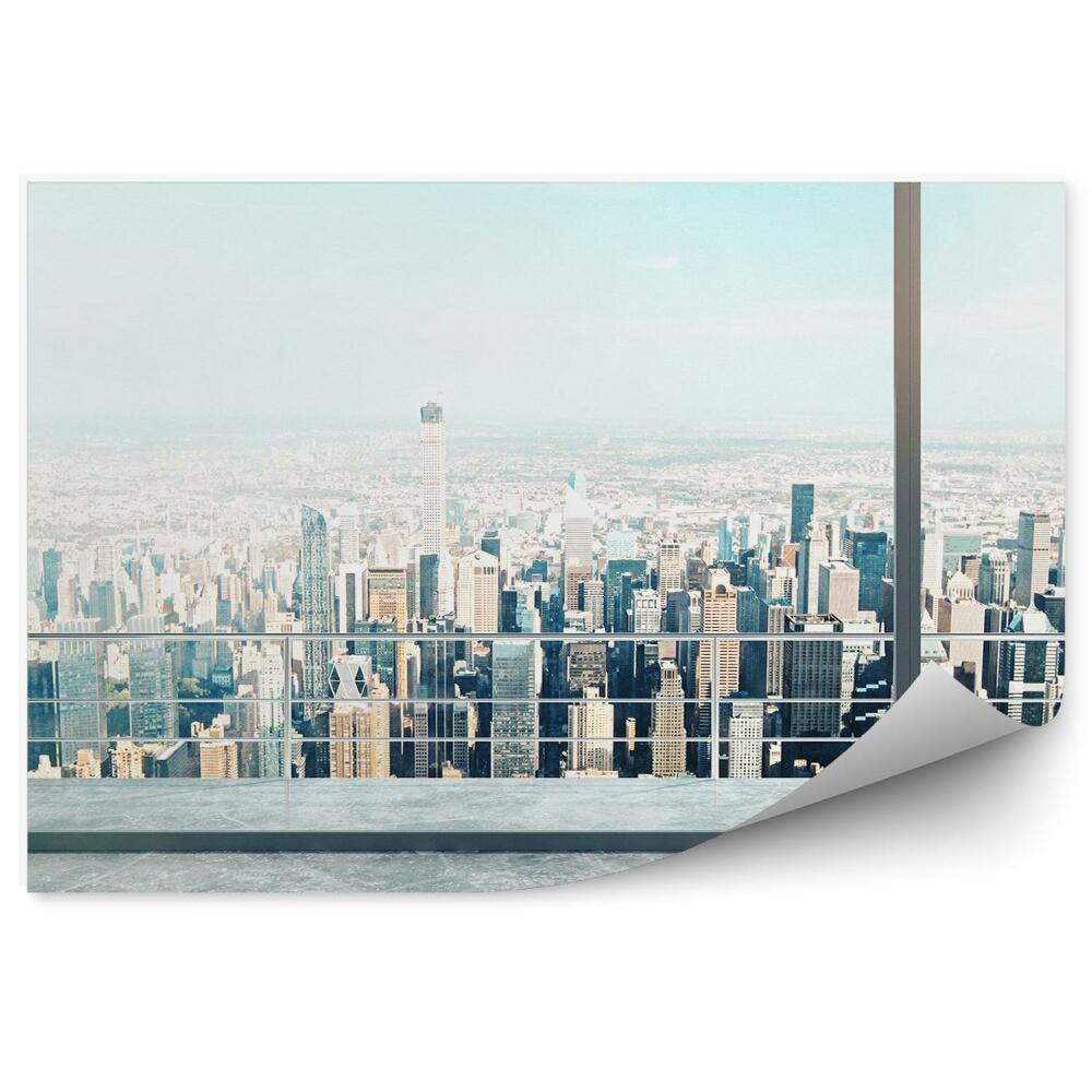 Fototapeta na stenu Pohľad z veľkého okna na panorámu mesta