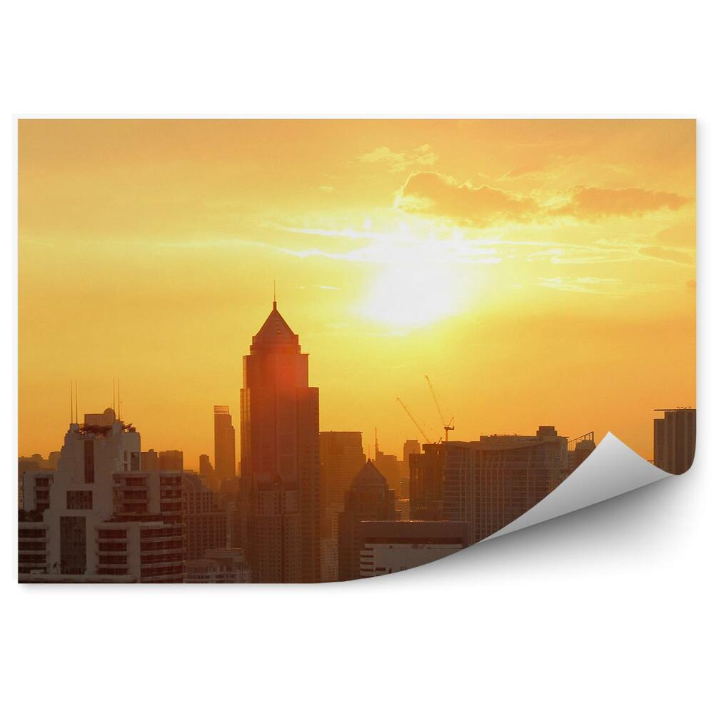 Fototapeta na stenu Západ slnka nad panorámou mesta mrakodrapy