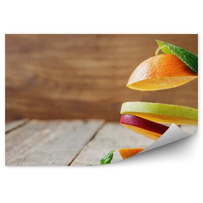 Fototapeta na stenu Lietajúce ovocie plátky jablko hruška pomaranč