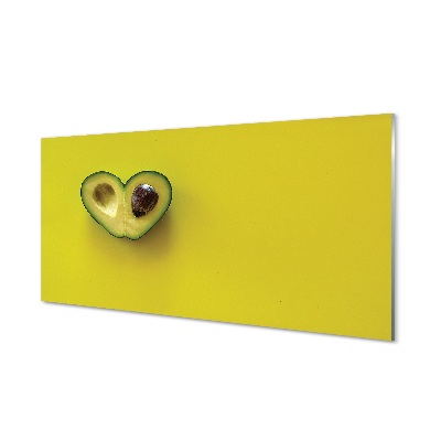 Obraz na skle Avokádo na zelenom pozadí