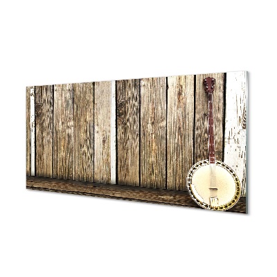 Sklenený obraz Ukulele opreté o plot