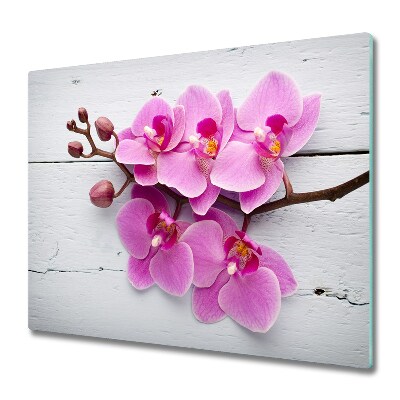 Sklenená doska na krájanie Orchidea na bielej tabuli